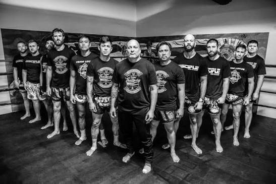 The Disciple MMA Academy team lined up in the ring